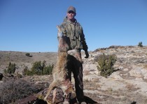 <p>KB and a coyote in some rough country. </p>