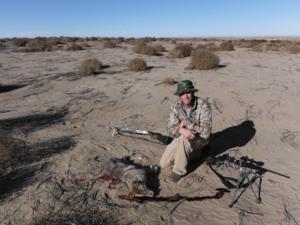 <p>This coyote melted like butter at 300+ yards with a single shot from a 22-250.  KB is very impressed with the long range knock down power of this cartridge.  12-27-13</p>