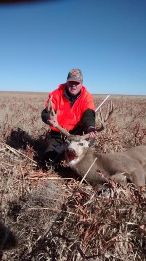 <p>Elmer of Duarte Outfitters with his nice 5x4 mule deer. 12-5-14</p>