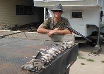 KB with some morning dove harvested on the second day of season.  He used a Stoeger 12ga coach gun with a 22 inch barrel and screw in chokes